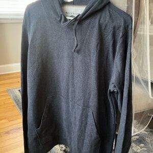 Woman’s navy blue and grey sweat shirts.  This is for both of them.